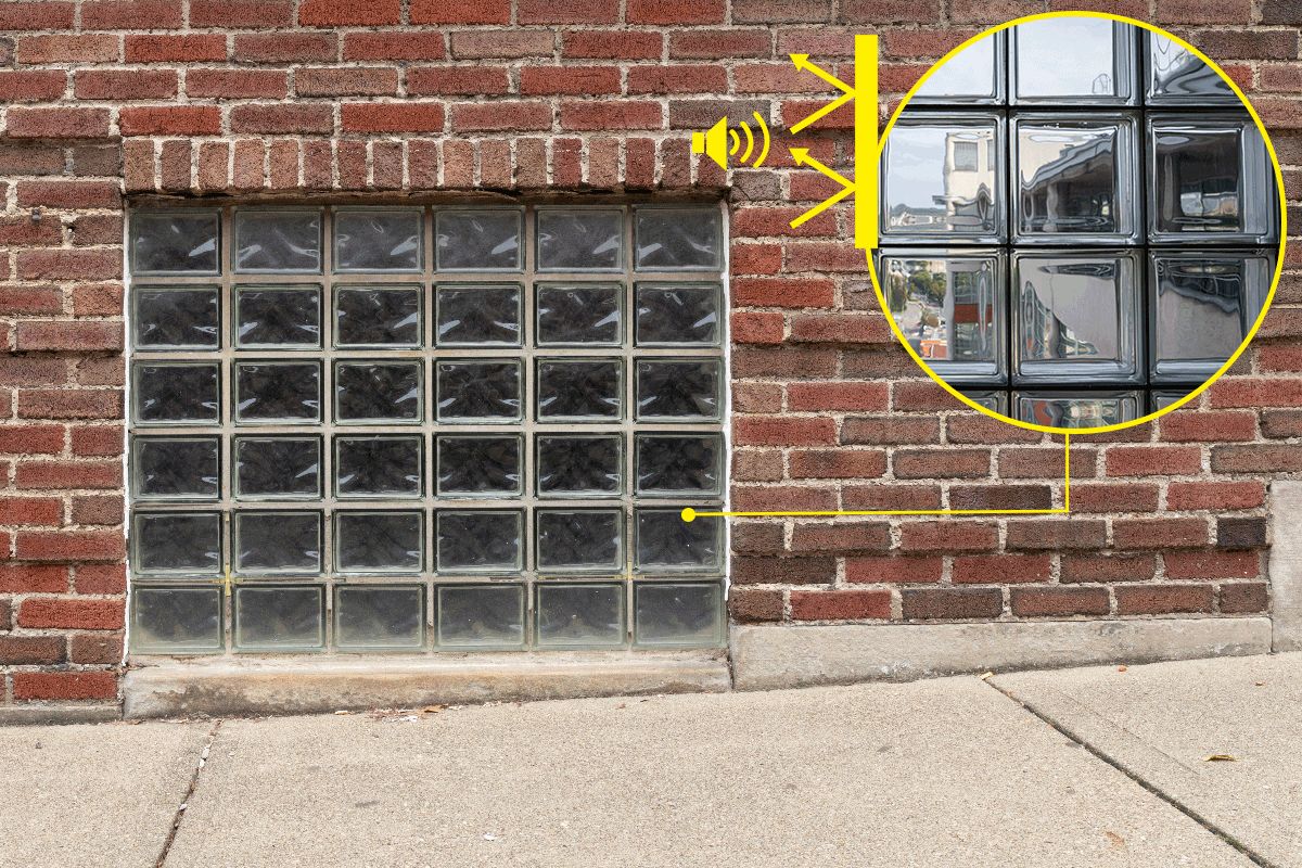 A glass block basement window in an old red brick building, Are Glass Block Windows Soundproof?