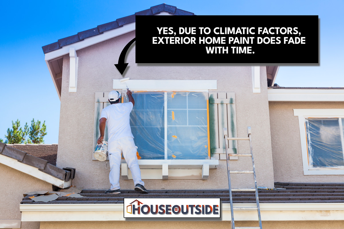 Busy House Painter Painting the Trim And Shutters of A Home, Does Exterior House Paint Fade Over Time?