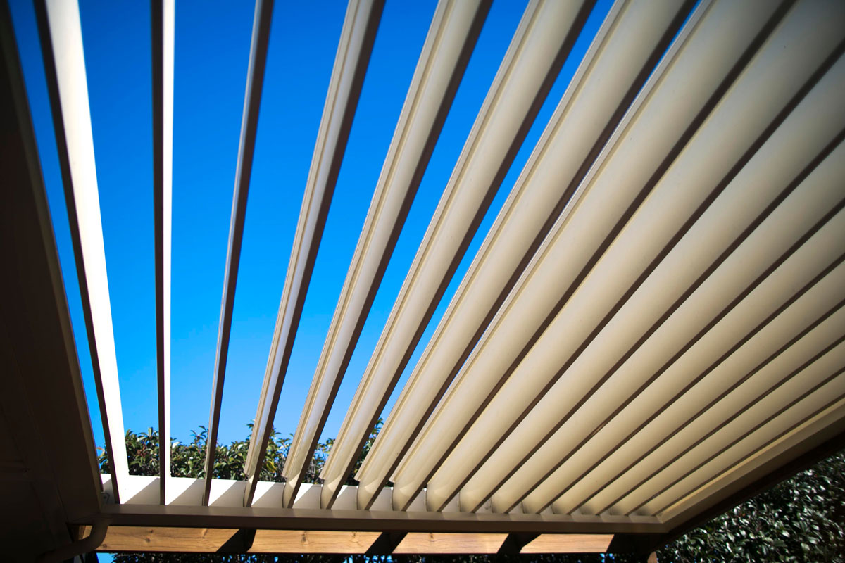 Gorgeous louvered roofing photographed on a blue sunny day