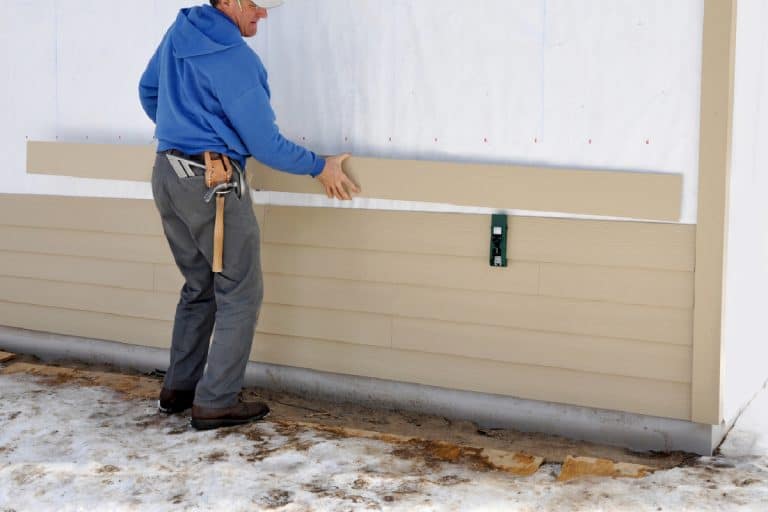A carpenter using gauge to install fibrous cement siding, Can You Use Roofing Nails For Hardie Siding?