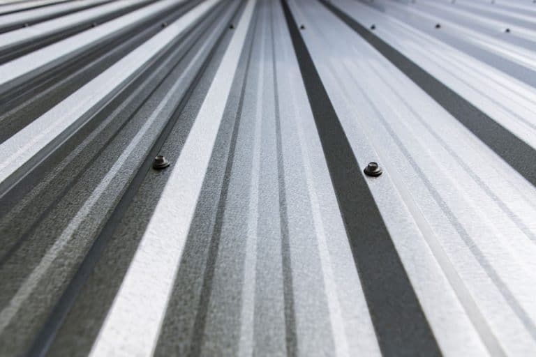 metal sheet of zinc roof on the top of the house, shiny silver colored roof, Does A Zinc Roof Need Ventilation?