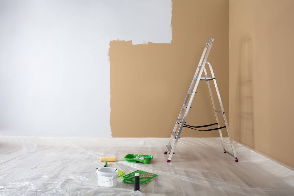 photo of a room, painting a room, ladder, paint brush, brown paint, white paint