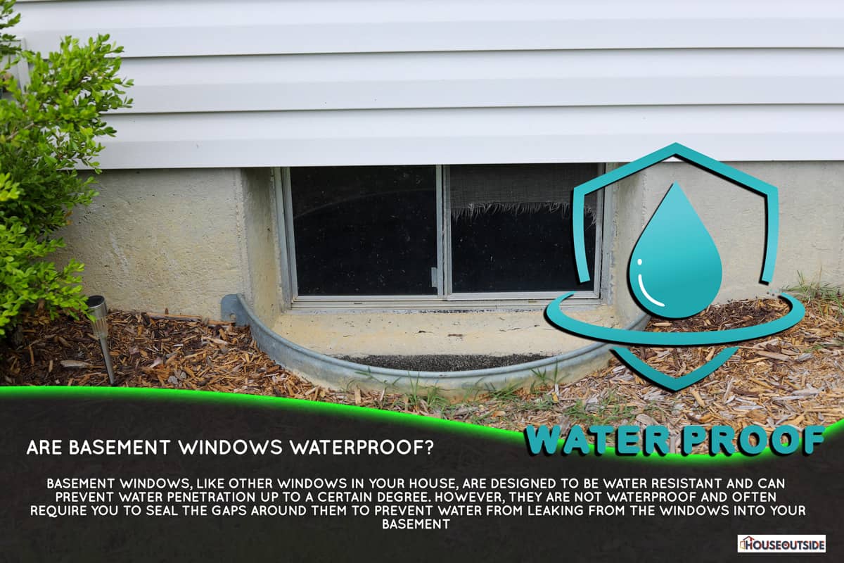 A view of a basement window  well of a residential home, Are Basement Windows Waterproof?