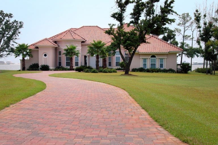 A beautiful house by the beach with brick driveway, Should Brick Driveways Be Sealed?