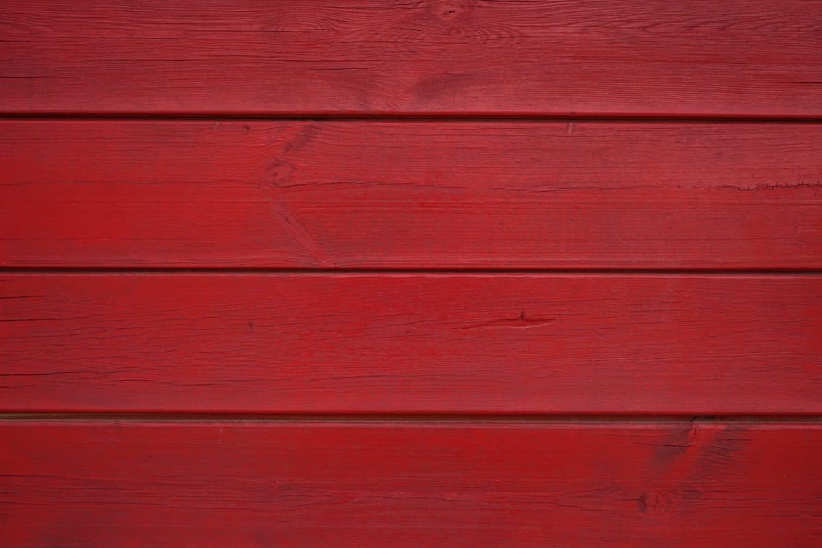 Deep red background made of wooden planks
