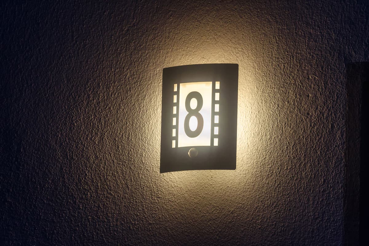 photo of an illuminated-house-number-outdoor-lamp-integrated