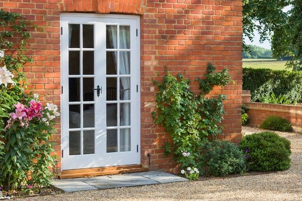 French doors outside a traditional Victorian house, Can You Use French Doors As Your Front Door?